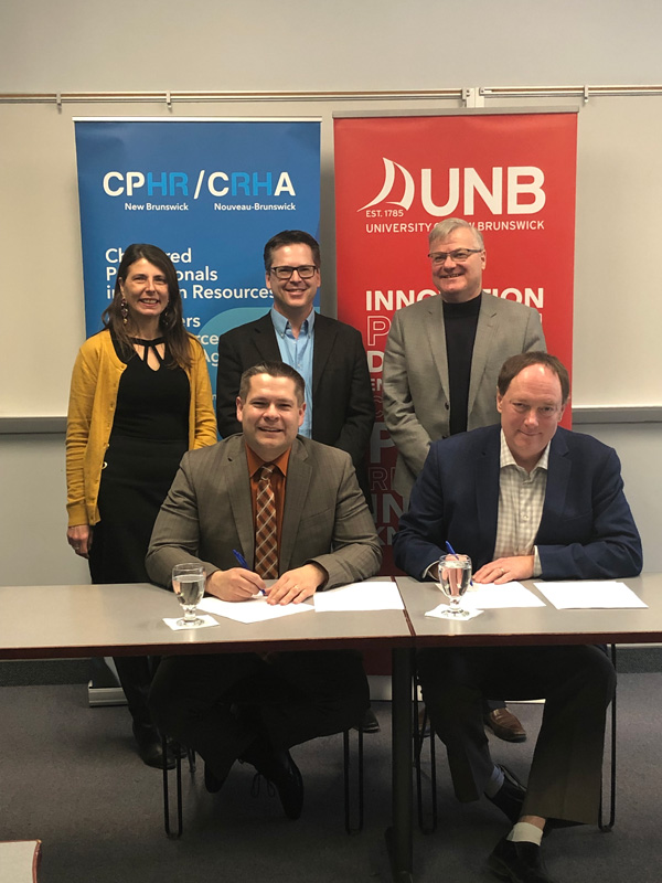 UNBSJ-CPHR-NB-Acreditation-Agreement UNB signs accreditation with CPHR